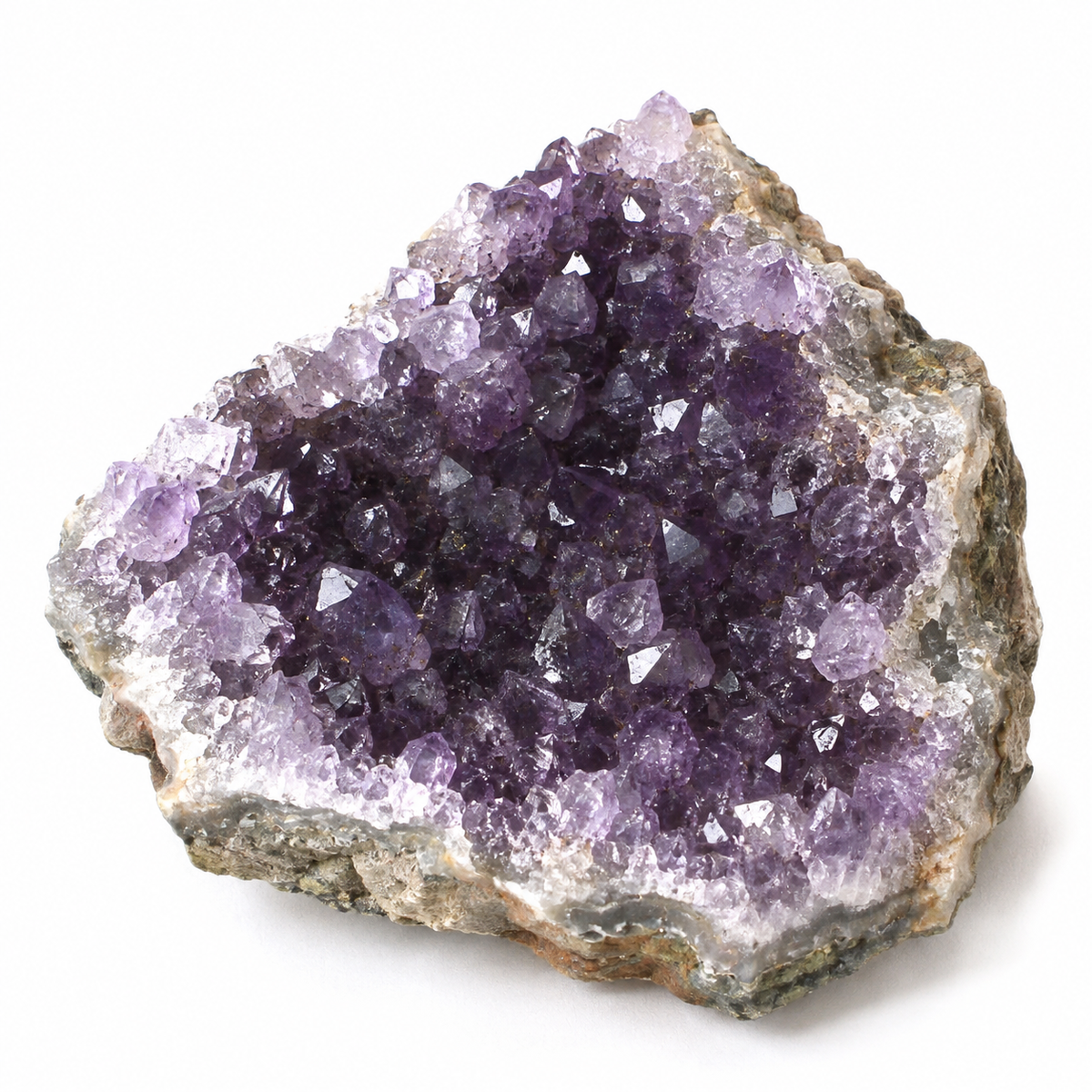 Representative irregular natural amethyst geode cluster variation on white