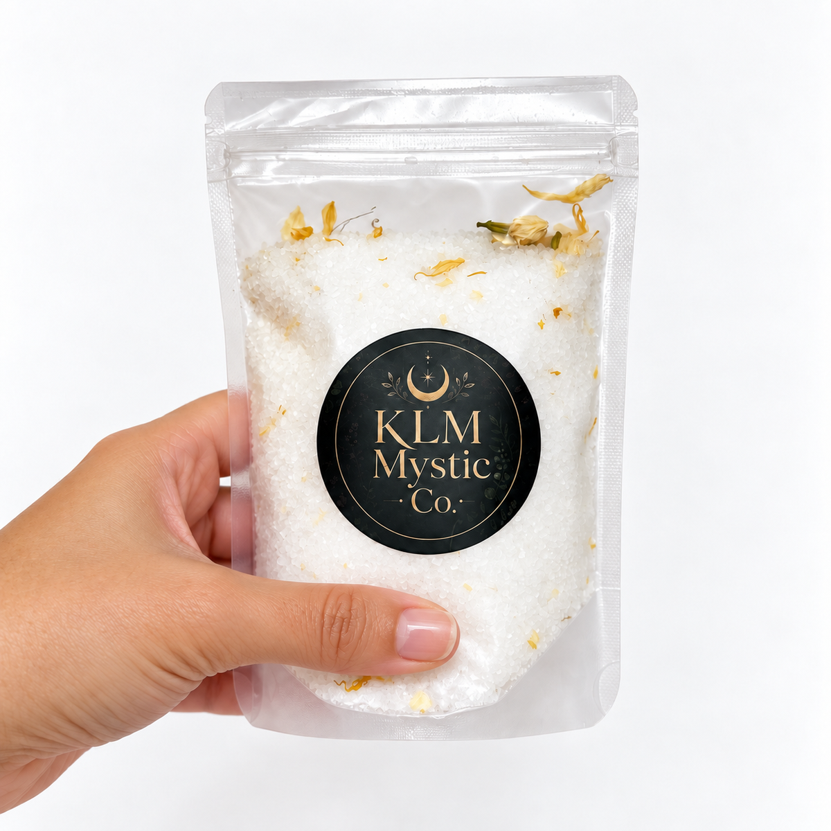 UPLIFT Jasmine Botanical Bath Soak by KLM Mystic Co. held in hand