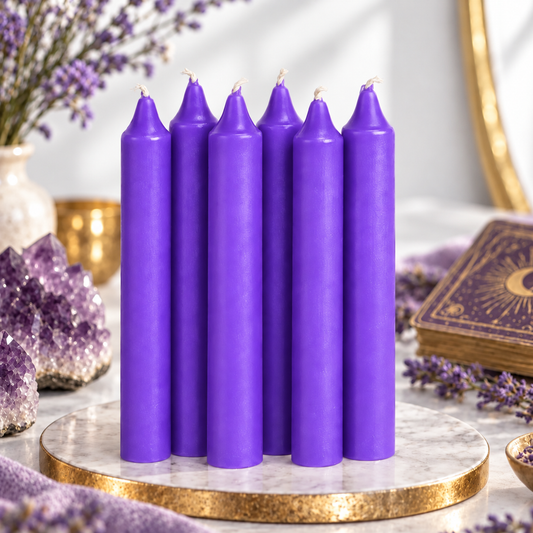 Set of six purple 6-inch intention candles with amethyst and lavender on a bright white background