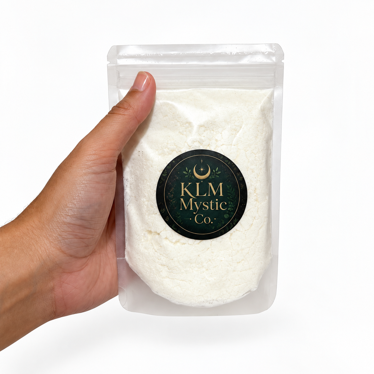 SOOTHE Coconut Mineral Bath Milk by KLM Mystic Co. held in hand